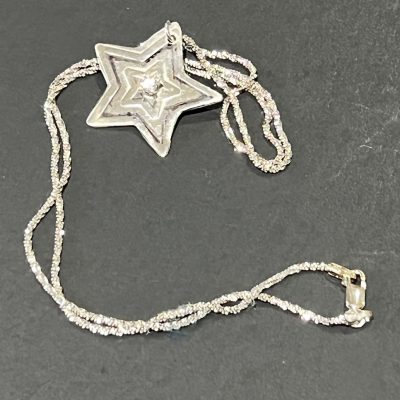 Sterling Silver star with white CZ set